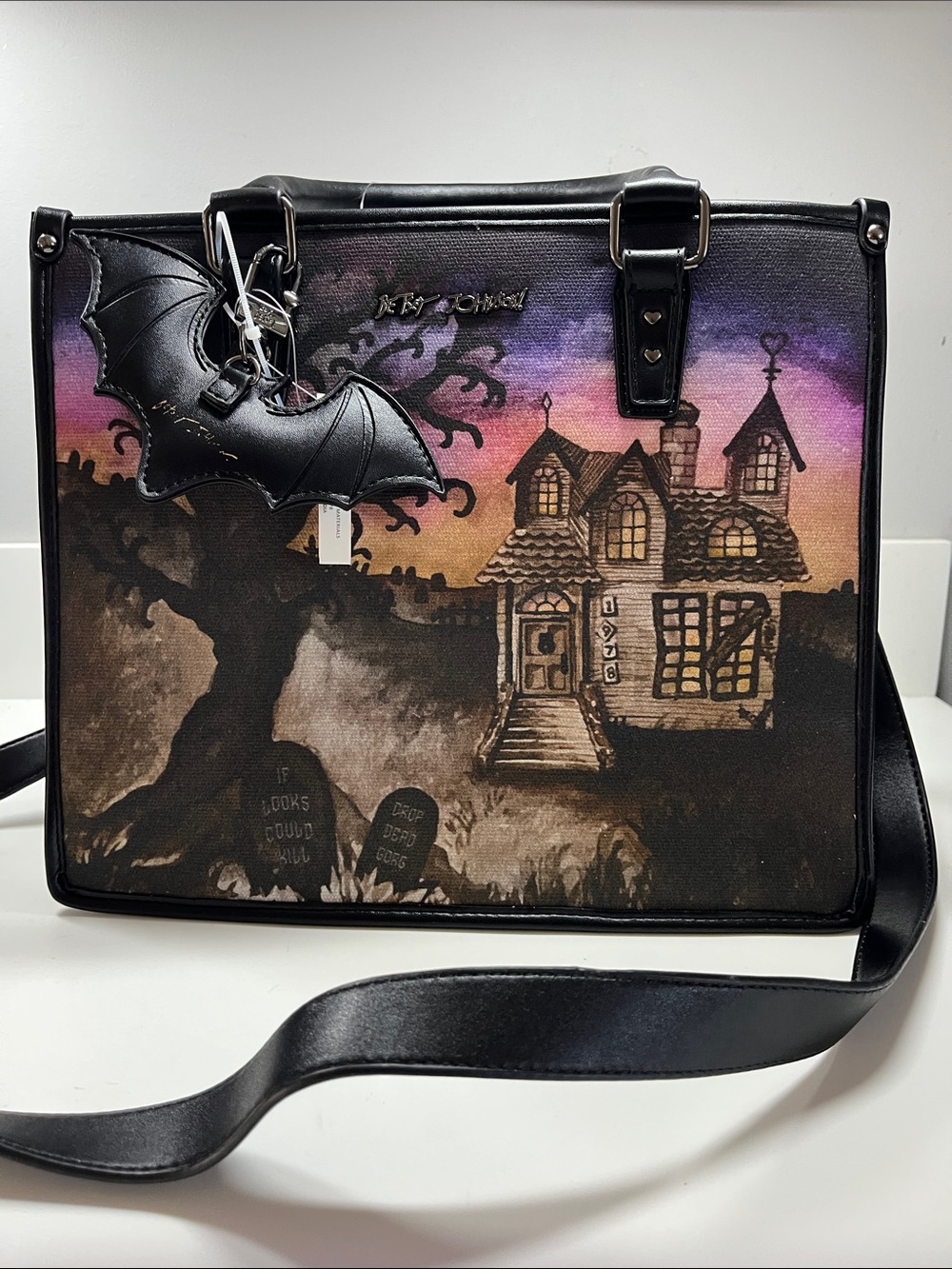 Betsey Johnson Black and Purple Haunted House Crossbody Bag with Bat Charm